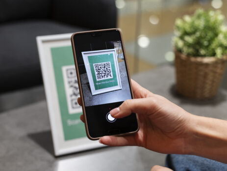 person scanning qr code 463x348